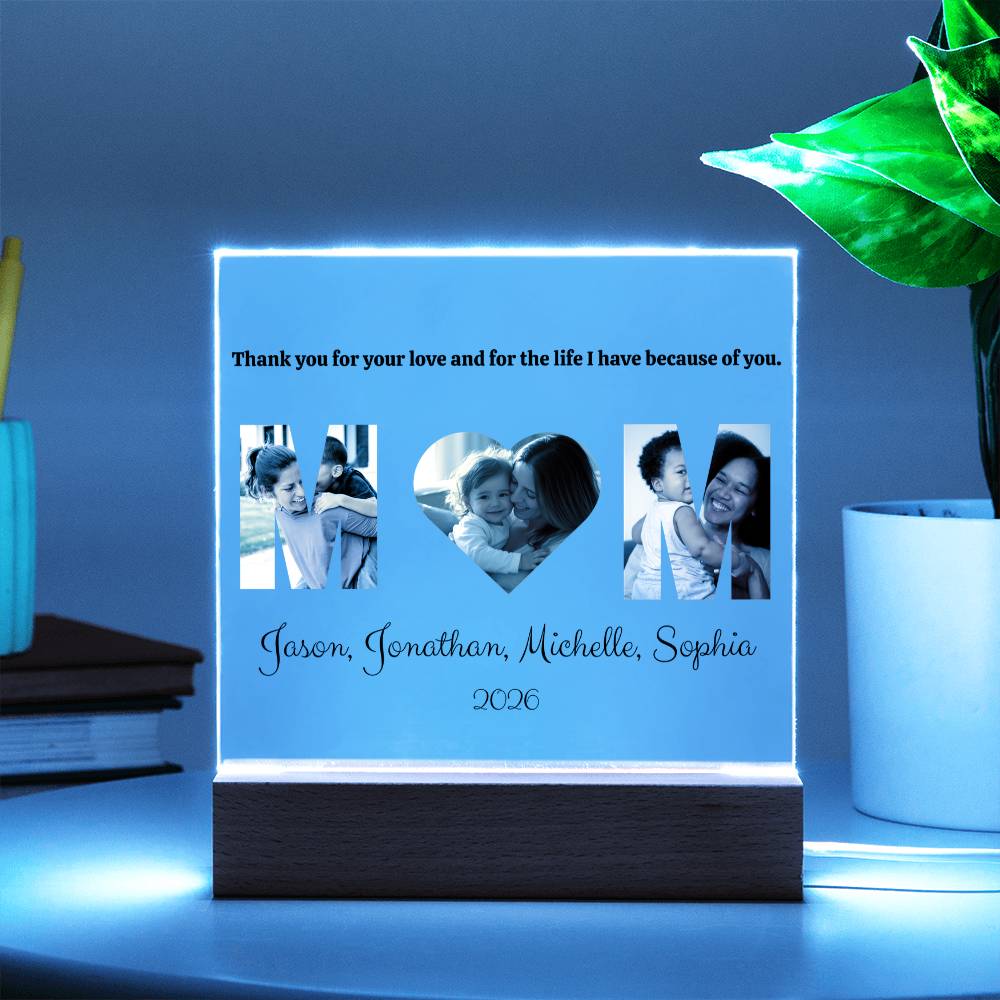 Personalized LED photo display with family photos and text on a blue background, battery base