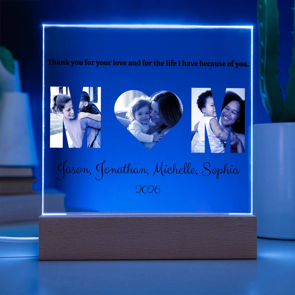 Personalized light box with family photos and text on a blue background