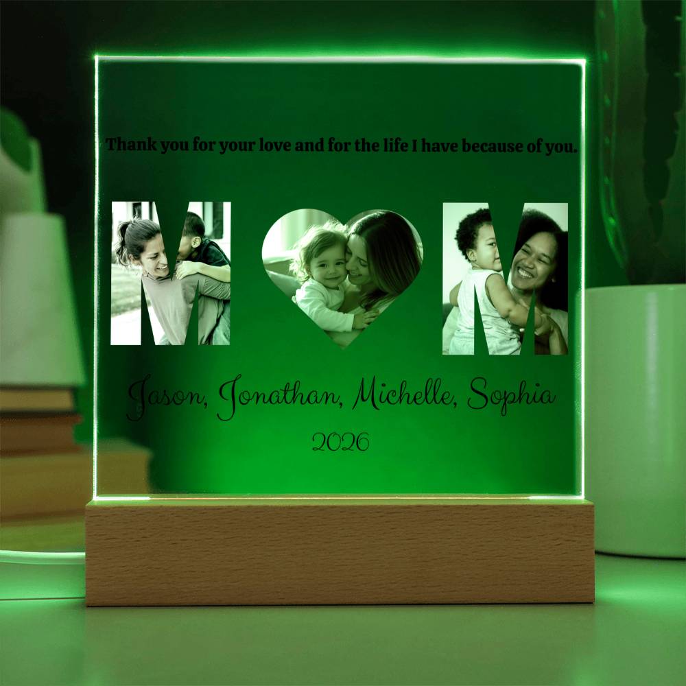 Personalized photo frame with green LED light displaying family photos and text.
