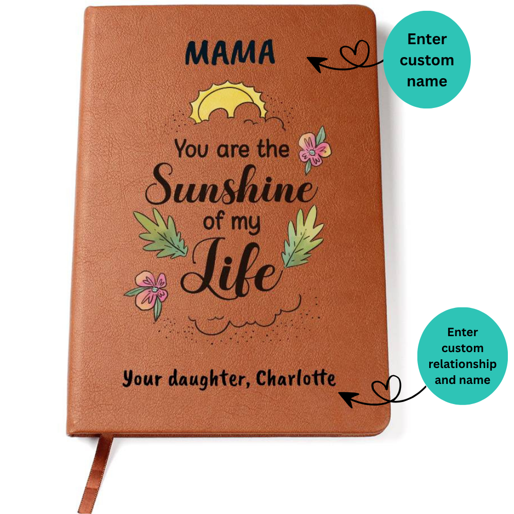 Brown notebook with decorative text and graphics on a white background