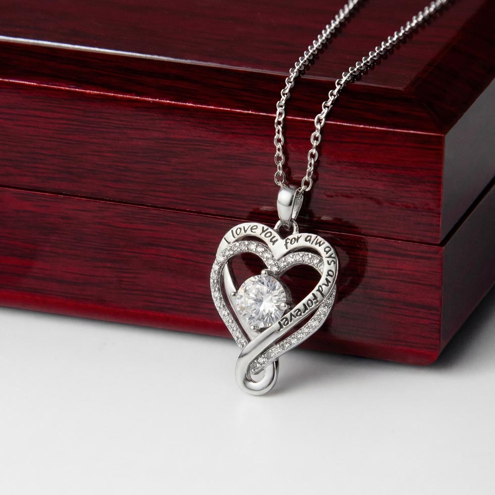 Heart-shaped White Gold Finish over Brass necklace with a cubic zirconia stone, with a mahogany LED-lit box