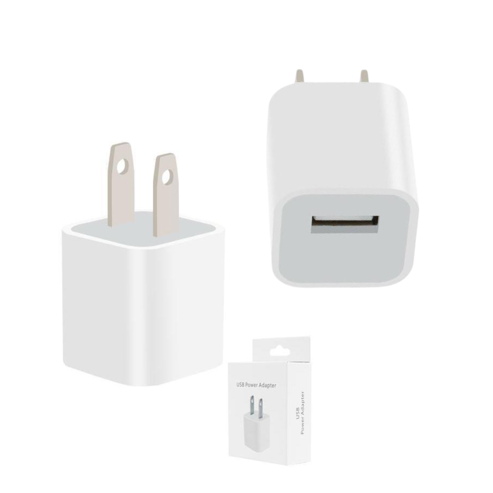 White 5W USB wall adapter power cube alongside retail packaging box