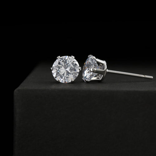 Close-up view of 6mm sparkling cubic zirconia stud earring showing 18k white gold finish setting