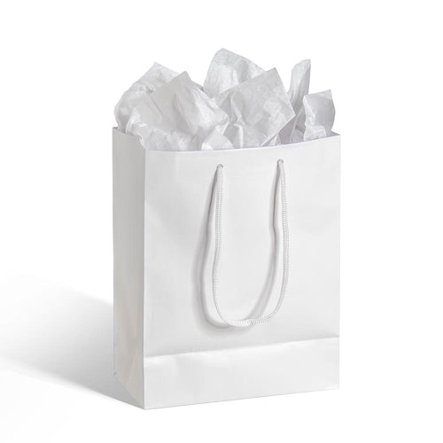White paper medium gift bag with rope handles filled with matching white tissue paper