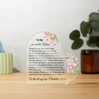 Personalized gift for a mother with floral design and heartfelt message on a wooden surface.