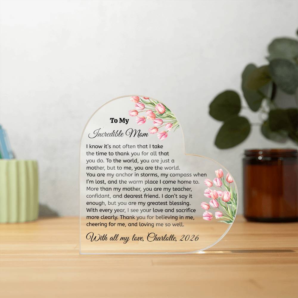 Personalized gift for a mother with floral design and heartfelt message on a wooden surface.