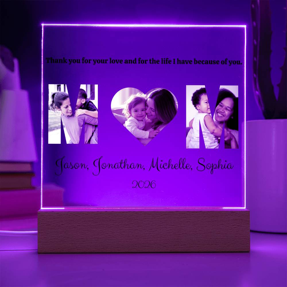 Personalized light box with family photos and text on a purple background