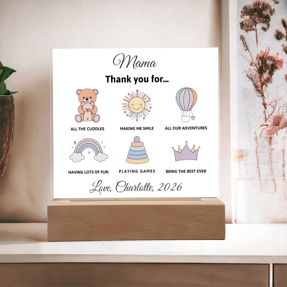 Personalized card with illustrations and text on a wooden stand.
