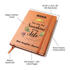 Notebook with 'MAMA You are the Sunshine of my Life' text and measurements on a white background